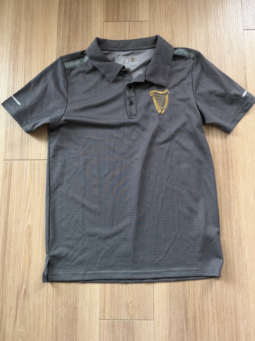 Guinness Charcoal Polo with Gold Harp Emblem